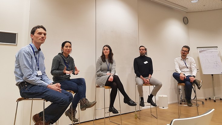A photograph taken during the alumni panel of 4 Ph.D.s in physics: (L to R) Lars Wacker, Nelly Nguyen, moderator Anna Bartling, Thomas Wulf and Bijan Chokoufe Nejad.